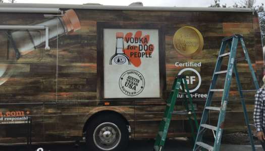 wood style graphics being installed on a box truck